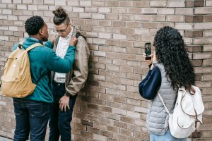 A bullying incident between students at a university campus, recorded with a smartphone.